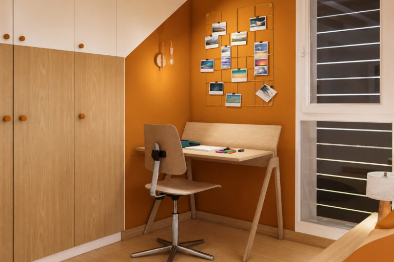 Coin bureau sur mesure aménagé sous pente dans une chambre d'enfant à Orvault avec rangements et décoration épicée
