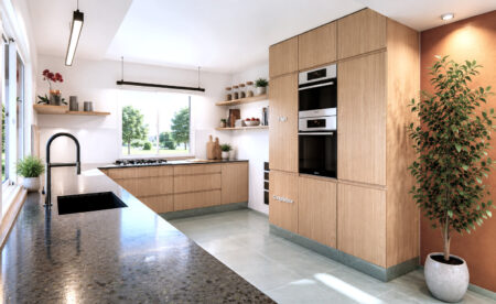 Cuisine contemporaine créée à Sautron après réunion de deux pièces avec implantation en L et mobilier sur mesure