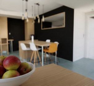Détail décoratif de la cuisine rénovée à Sautron avec profondeur de champ sur l'espace repas