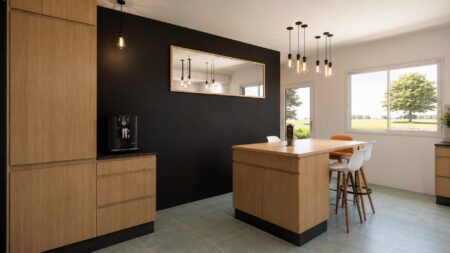Îlot central avec espace repas créé lors de la rénovation d'une cuisine à Sautron après fusion de deux pièces