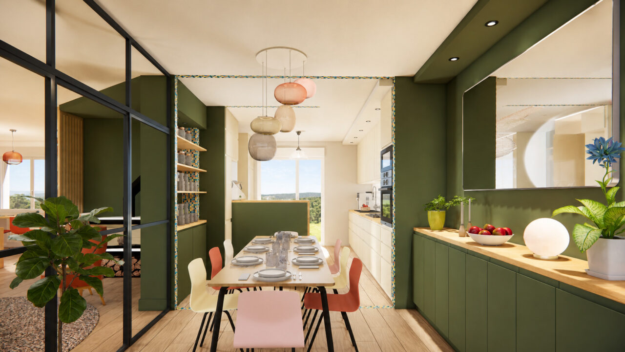 Salle à manger intégrée à l'agrandissement de la cuisine dînatoire à Nantes avec luminaires en verre soufflé et mobilier coloré.